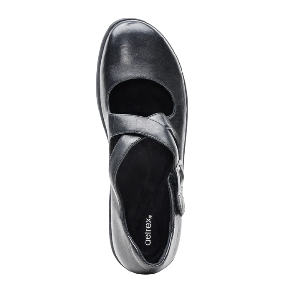 Black sandal with a strap on a white background