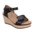 The Aetrex Women's Sydney Black Cutout by AETREX WORLDWide INC features decorative cutout straps, a silver buckle ankle closure, cushioned tan insole with arch support, and a braided jute-wrapped espadrille wedge sole for stylish comfort.