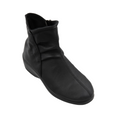 An ARCOPEDICO Arcopedico Paluma Black ankle travel boot in black leather features a low heel, Twin Arch Support, and a side zipper, shown against a white background.