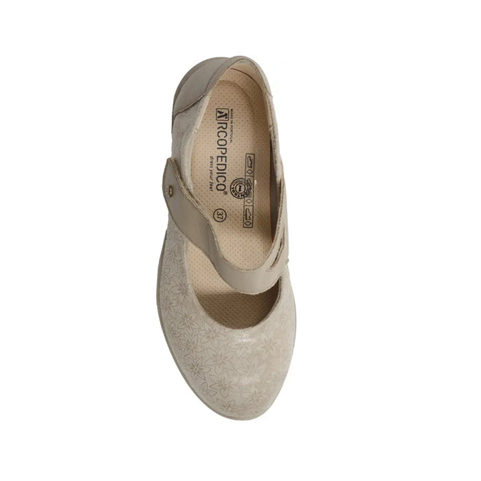 Top view of the ARCOPEDICO Womens Cosmo Taupe Mary Jane, featuring a floral pattern, textured insole, and a single strap with button closure across the instep.