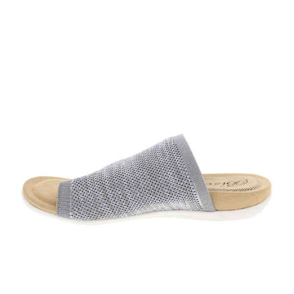 The Biza Womens Lavish Stone by BIZA FOOTWEAR is a stretch knit sandal with a light gray mesh open-toe upper, beige cushioned footbed, and white sole—perfect for travel—shown against a white background.