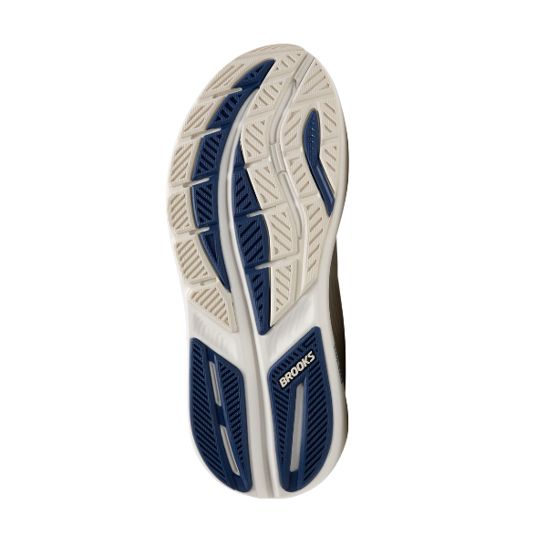 The image displays the sole of the BROOKS Men's Ghost Max 3 Coconut, showcasing a white base with blue and black tread patterns for enhanced grip, flexibility, and cushioned support.