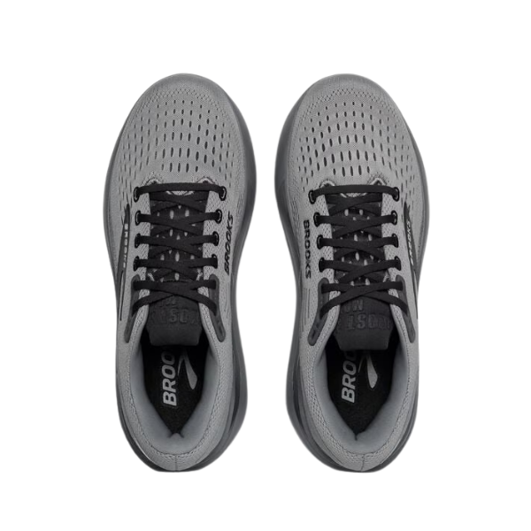 The BROOKS Men's Ghost Max 3 Wide Grey running shoes feature a ventilated mesh upper, black laces, and branding on the tongue and side. Designed for comfort and foot pain relief, they offer a wide fit for enhanced support.