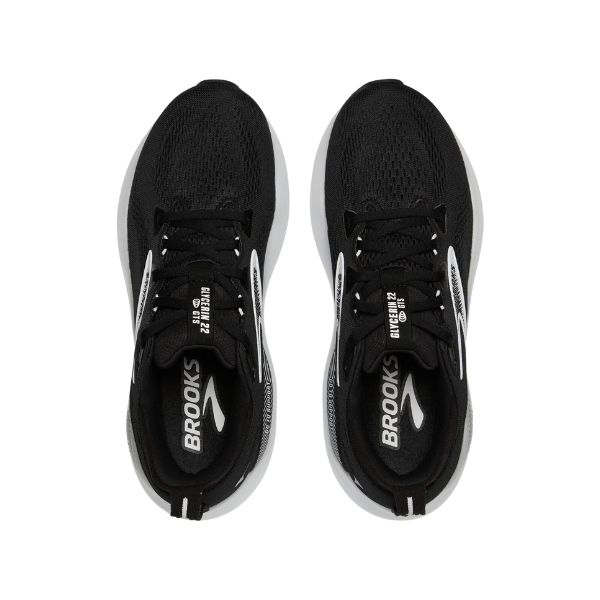 A pair of Brooks Mens Glycerin GTS 22 Wide Black/White running shoes by BROOKS, with white soles and branding, and plush cushioning, shown from above against a white background.