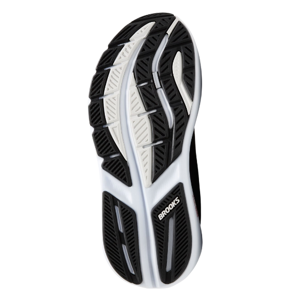 The image shows the sole of the BROOKS Women's Ghost Max 3 Wide Black/Rose Gold, featuring a black, white, and gray tread for optimal grip and flexibility. The Brooks logo appears near the heel, ideal for plantar fasciitis support.