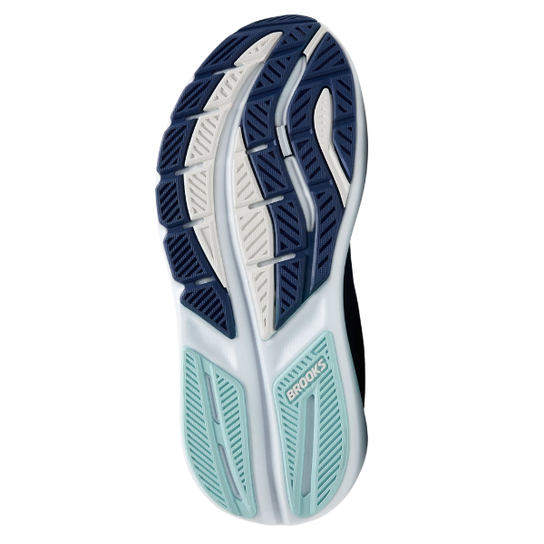 The image shows the sole of the Brooks Women's Ghost Max 3 Wide Navy/Peacoat running shoe. Blue, white, and teal tread patterns with textured grooves offer traction and foot pain relief. "BROOKS" appears on the teal section near the heel.