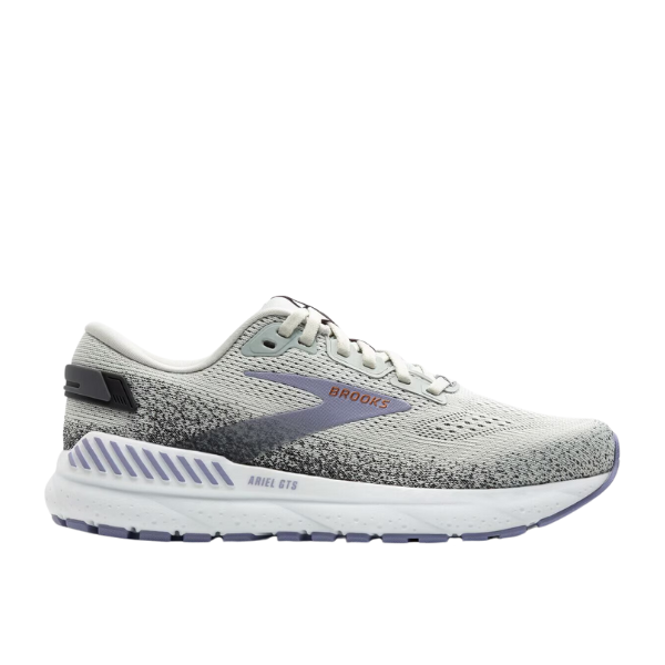The Brooks Womens Ariel GTS 24 Grey/Purple Wide is a supportive running shoe in light gray with purple accents, a black speckled gradient pattern, and a white sole. Features BROOKS branding and Ariel GTS on the side.