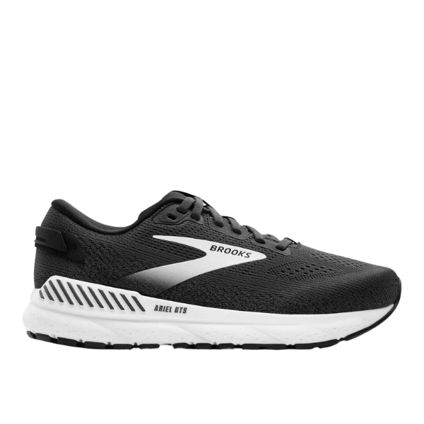 The BROOKS Womens Ariel GTS 24 Wide Black/White features a breathable mesh upper, thick cushioned sole, and GuideRails support system for maximum stability.