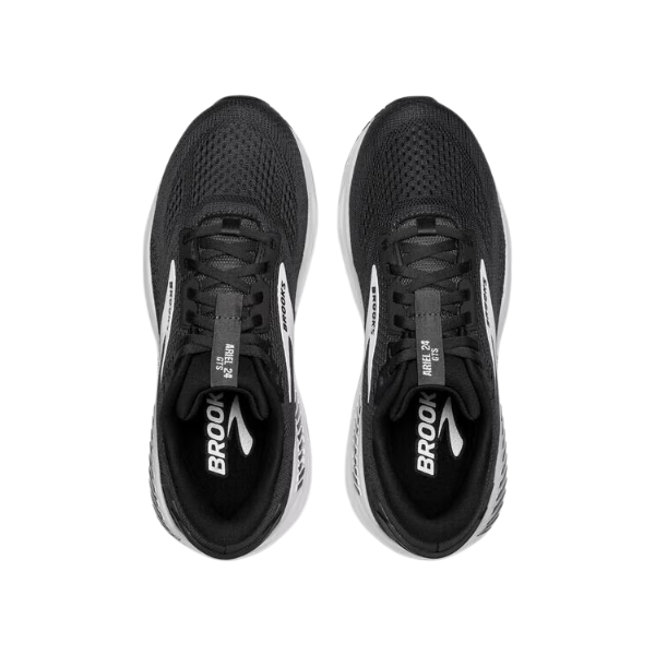 Top-down view of a pair of BROOKS Womens Ariel GTS 24 Wide running shoes in Black/White with black laces, shown side by side on a white background, featuring the GuideRails support system for maximum support.