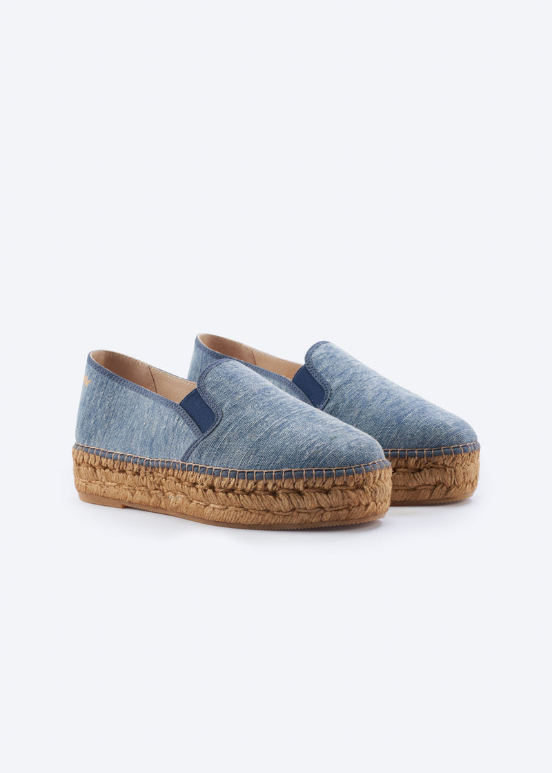 Washed denim espadrille flatforms with side gore detail and a natural braided jute platform sole, handcrafted in Spain