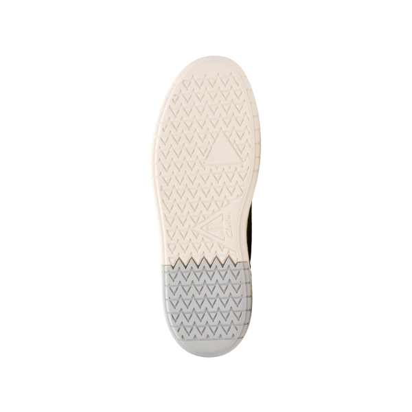 The CLARKS Mens Courtlite 2 Run Olive sneaker has a lightweight EVA sole with a zigzag tread, mainly off-white with a gray heel section. Triangular logo shapes are embossed near the center and heel of the sole.