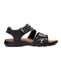 The Clarks Womens Wide Kitly Ave Black Leather sandal by CLARKS features adjustable straps, a cushioned tan Contour Cushion footbed, and a low contoured black sole for comfortable, casual wear.
