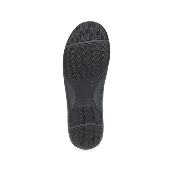 Dansko Women's Sherry Black features a black textured rubber sole with wavy tread for slip-resistant comfort.
