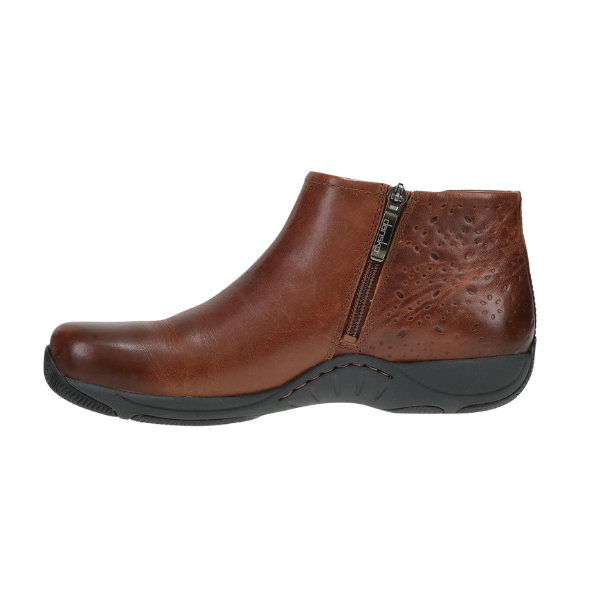 Dansko Women's Sherry Cinnamon bootie features a side zipper, black sole, arch support, and subtle heel perforations.
