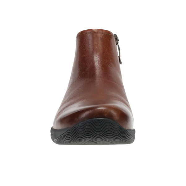 Front view of Dansko Women's Sherry Cinnamon, a slip-resistant boot with arch support, against a white background.