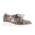 The DJANGO & JULIETTE Womens Onstage Pink Multi Leather shoe is a stylish lace-up with a multicolored sequin pattern, cut-out details, and a thick white sole, shown side view on a white background.