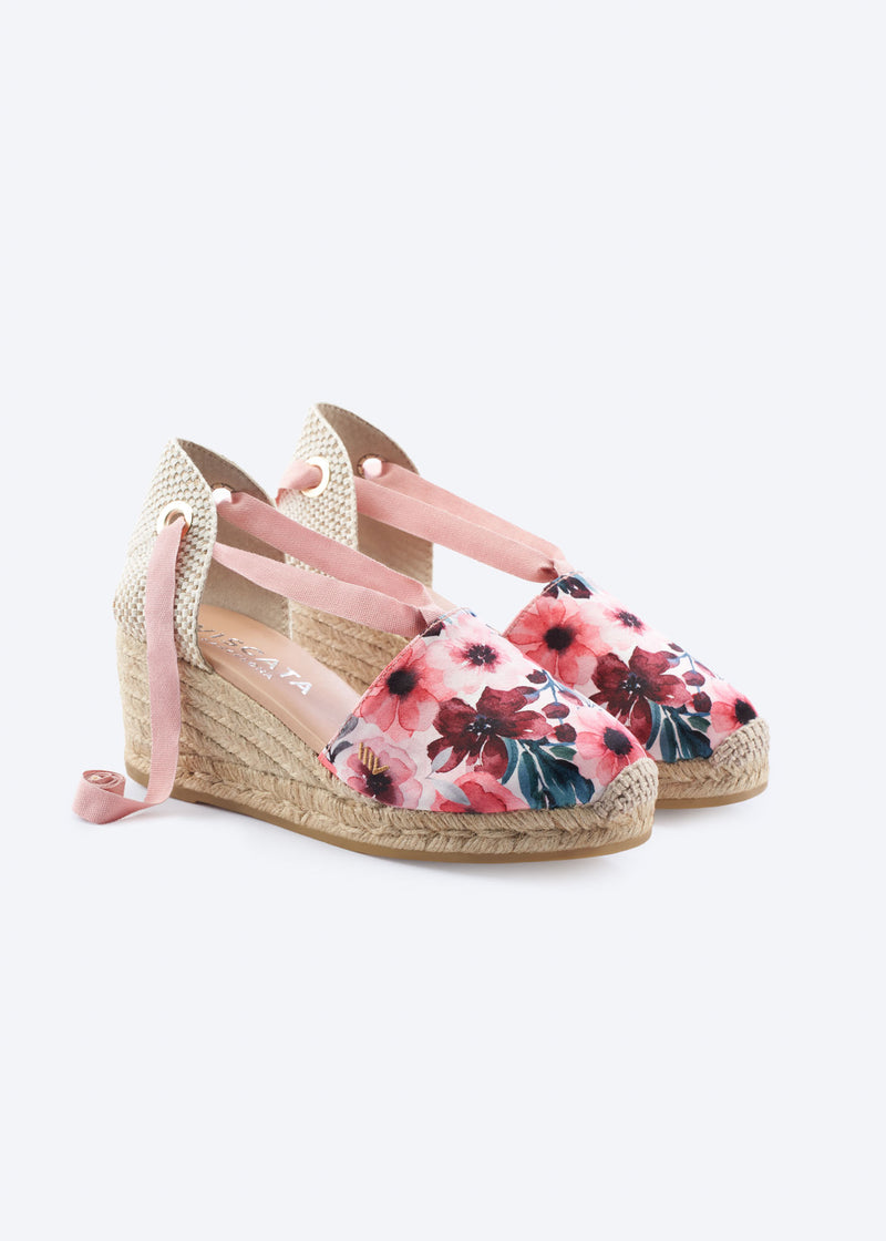 Floral print espadrille wedge with wraparound ankle ties and a natural braided jute wedge, handcrafted in Spain