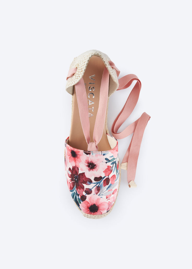 Top view of floral print espadrille wedge with wraparound ankle ties and a closed toe, handcrafted in Spain