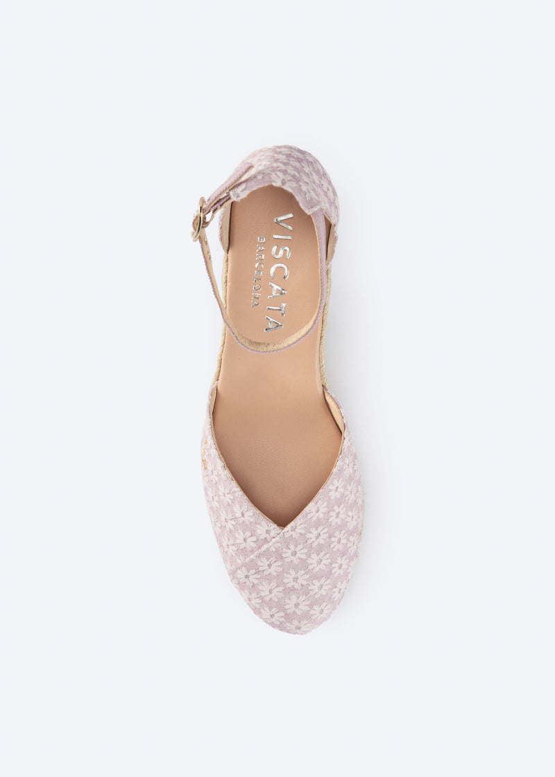 Top view of pale pink floral wedge espadrille with crossed vamp, ankle strap, and a natural braided jute wedge, handcrafted in Spain