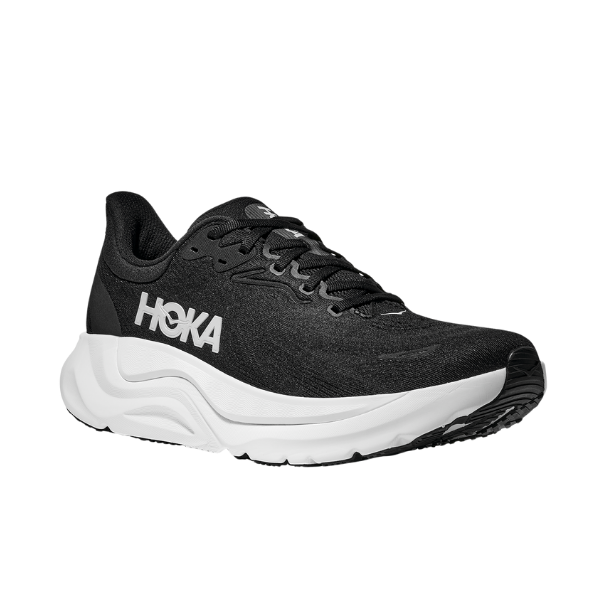 The HOKA mens Arahi 8 Wide in Black/White features a thick white sole, black laces, and a white HOKA logo on the side, plus advanced H-frame technology, displayed at an angle against a plain white background.