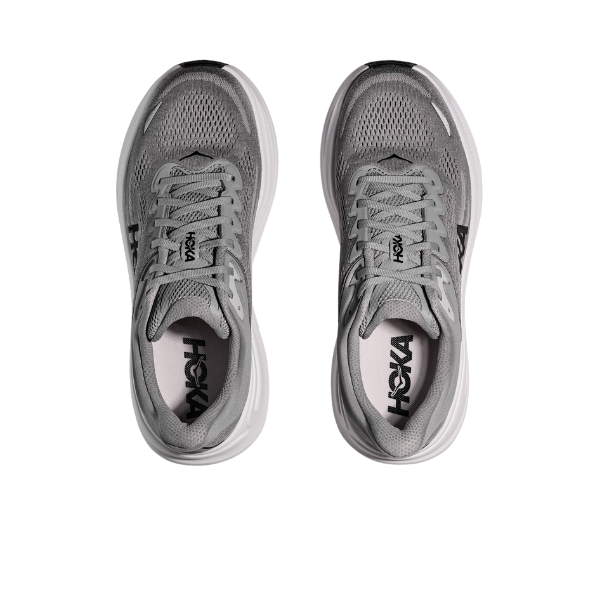 Top view of HOKA Mens Bondi 9 Wide in Galactic Grey/Stellar Grey, featuring ultra-cushioned white soles for exceptional foot pain relief, placed side by side on a white background.
