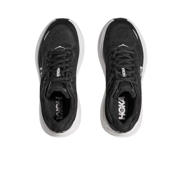 The HOKA Womens Bondi 9 Black/White running shoes feature an ultra-cushioned design for comfort and foot pain relief, with a visible HOKA logo. Shown from above, their black upper and white soles stand out against a plain white background.