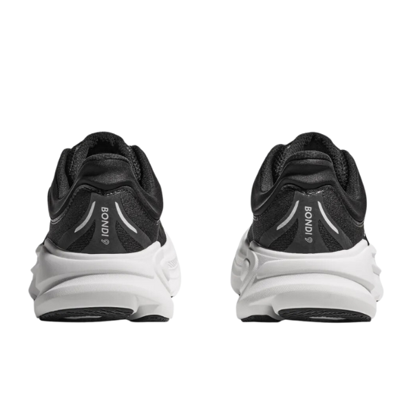 Rear view of HOKA Womens Bondi 9 Black/White sneakers with BOUNCE branding on the heel tabs and thick, white cushioned soles designed for foot pain relief.