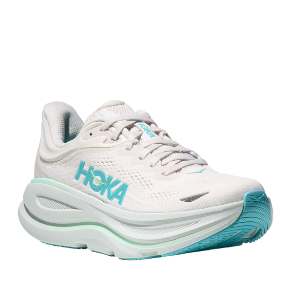The HOKA Womens Bondi 9 White/Blue running shoe features light blue accents, an ultra-cushioned sole, and the HOKA logo on the side, shown against a plain white background.