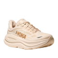The HOKA Womens Bondi 9 Wide in Vanilla/Birch features a thick, ultra-cushioned sole and mesh upper with the gold HOKA logo—perfect for foot pain relief.