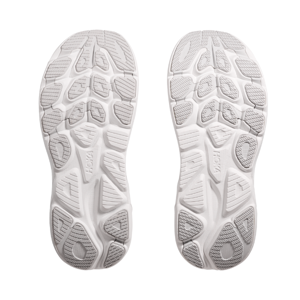 White shoe sole with tread pattern on a white background
