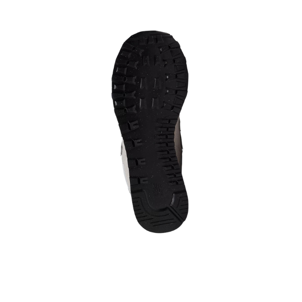 The image shows the black, textured sole of the NEW BALANCE Mens 574 White/Grey sneaker against a white background. Its rugged tread enhances grip and durability, making these shoes comfortable and supportive for foot pain relief.