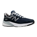 The New Balance Mens 990 V6 Wide Navy is a navy and gray running shoe featuring white laces, a white and gray sole, and the iconic silver “N” logo on the side.