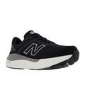The New Balance Womens Fresh Foam X 1540v4 Wide in Black/White features a large white N logo, cushioned Fresh Foam X midsole, and black outsole, displayed at an angled side view on a white background.