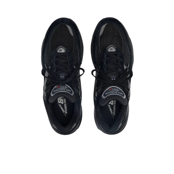 A pair of New Balance Mens 990v6 Black sneakers by NEW BALANCE are shown side by side on a white background, viewed from above, featuring black laces, N logos, 990 tongue labels, and FuelCell midsole cushioning for comfort.