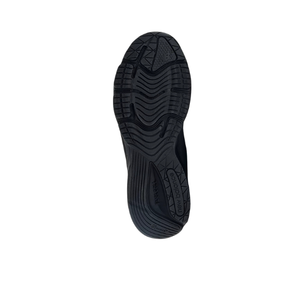 The image shows the black rubber sole of the New Balance Mens 990v6 Black athletic shoe, featuring a textured tread and NEW BALANCE branding. The plain white background highlights the FuelCell midsole cushioning for enhanced performance.