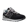 The New Balance Womens 574 Core Black/White sneaker features black and gray accents, gray laces, a white midsole, a large N logo on the side, 574 branding on the tongue, and a black outsole with textured grip.
