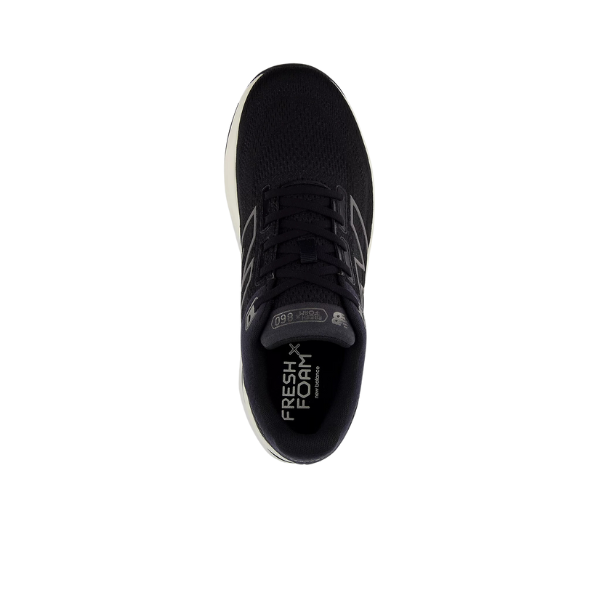 Top view of the New Balance Womens Fresh Foam 860v14 in black/white, featuring a white sole, black laces, Fresh Foam insole branding, and a Stability Plane; isolated on a white background.
