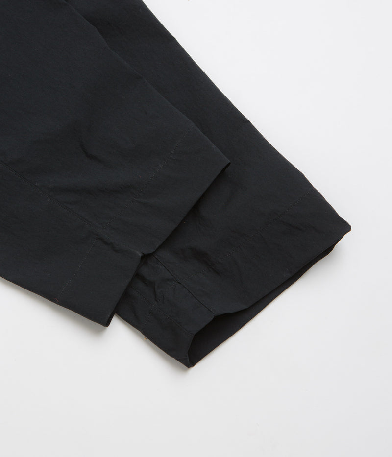 Nike ACG Black Iguana 2-in-1 Trousers in Black and Black / Summit White