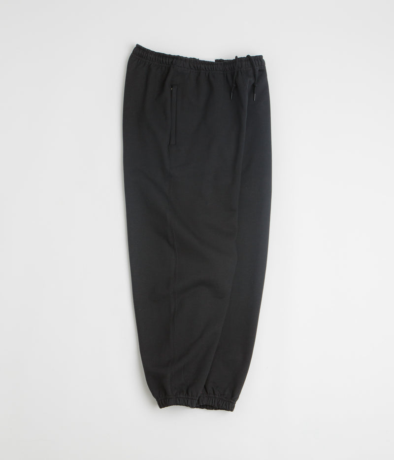 Nike Solo Swoosh Cuffed Sweatpants in Black and Black / White