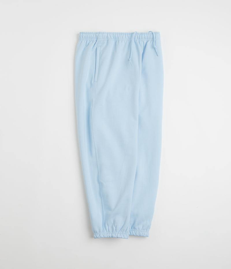 Nike Solo Swoosh Cuffed Sweatpants in Celestine Blue and Celestine Blue / White