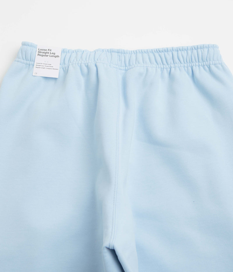 Nike Solo Swoosh Cuffed Sweatpants in Celestine Blue and Celestine Blue / White
