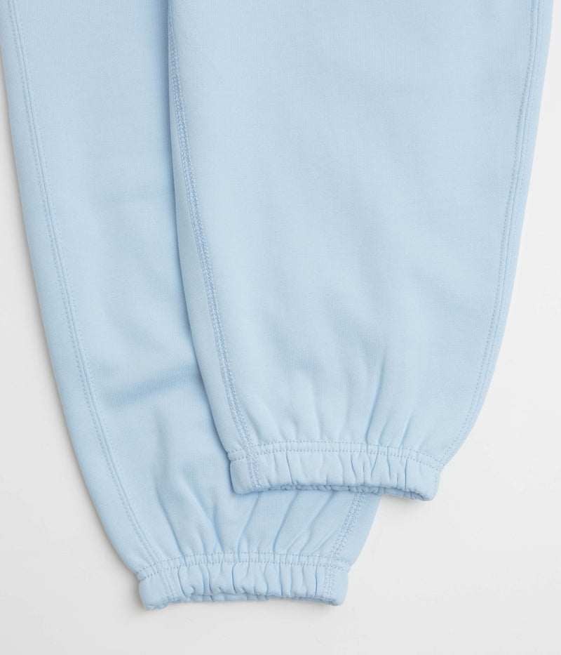 Nike Solo Swoosh Cuffed Sweatpants in Celestine Blue and Celestine Blue / White