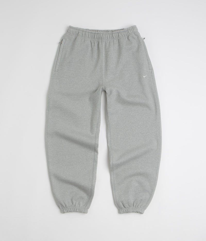 Nike Solo Swoosh Cuffed Sweatpants in Dark Grey Heather and Light Smoke Grey / White