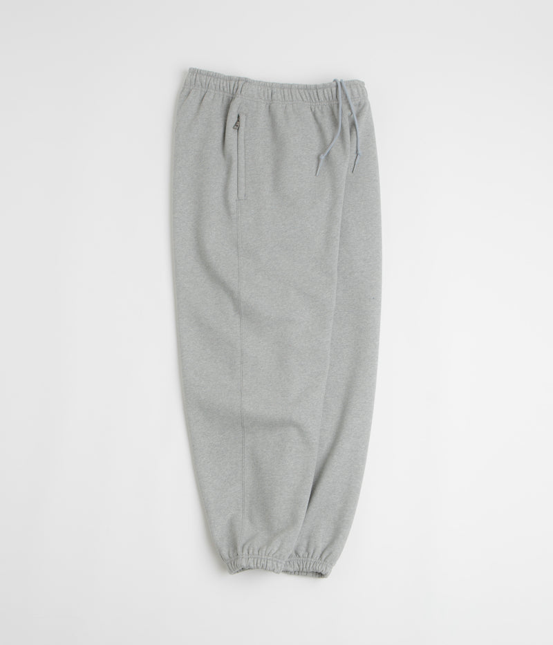 Nike Solo Swoosh Cuffed Sweatpants in Dark Grey Heather and Light Smoke Grey / White