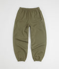 Nike Solo Swoosh Cuffed Sweatpants in Medium Olive and Medium Olive / White