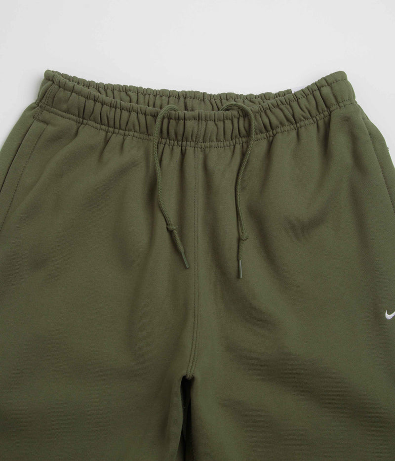 Nike Solo Swoosh Cuffed Sweatpants in Medium Olive and Medium Olive / White