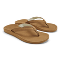 A pair of OLUKAI Womens Southshore Toffee flip-flop sandals featuring tan fabric straps, a cushioned sole, and a durable Wet Grip Rubber® outsole, shown against a plain white background.