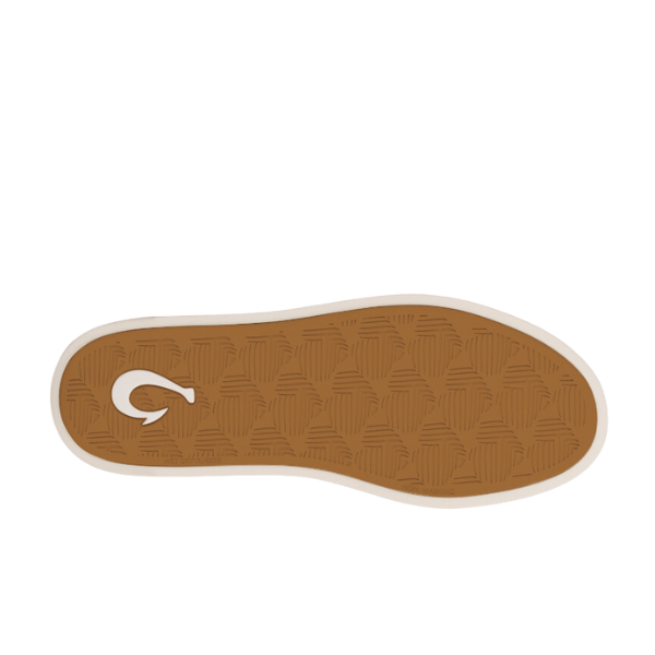 Brown rubber sole with a geometric pattern and white curved logo near the heel, seen from above on a white background—designed by OLUKAI for the Womens Tape Pehuea with an anatomical footbed for all-day comfort.