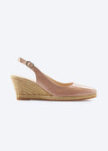 Side view of blush pink leather wedge espadrille sandal with slingback strap, pointed closed toe, and natural braided jute wedge, handcrafted in Spain