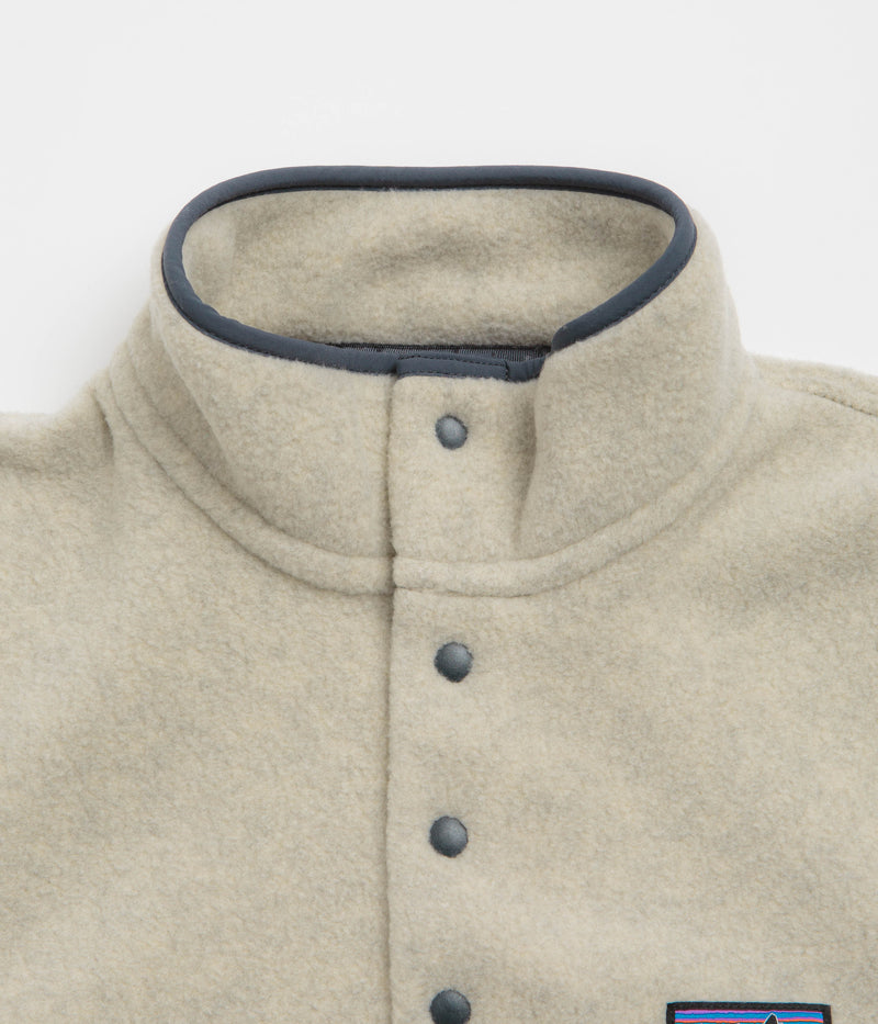 Patagonia Lightweight Synchilla Snap-T Fleece in Oatmeal Heather and Smolder Blue